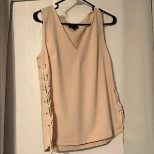 blouse that has never been worn light pink